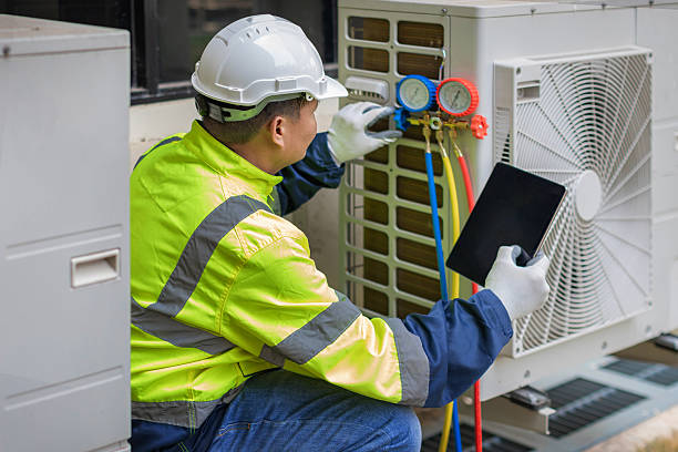 Professional Hvac technician working in Shawnee Mission, KS
